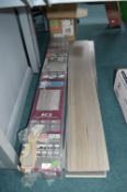 *One and a Half Packs of Grey Laminate Flooring