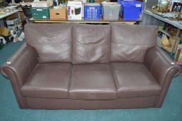 Brown Leatherette Three Seat Sofa Bed