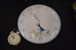 Laura Ashley Wall Clock and an Alarm Clock