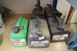 *Four Black and One Green Fuel Cans