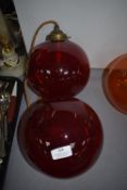 Two Red Glass Globe Pendant Lights