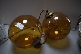 Two Brown Glass Pendant Lamps