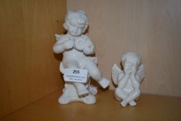 Pair of Pottery Cherubs