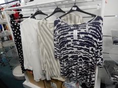 *Four Assorted Size: 18 Tops and Skirts