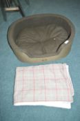 *Le Chameau Designer Dog Bed and a Plaid Dog Blanket