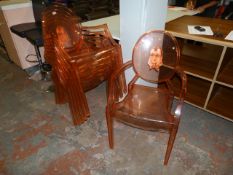 *Six Stackable Transparent Pink Plastic Chairs