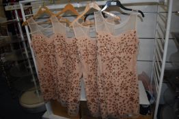 *Four Izabel Sequin Dresses in Salmon Size: 12