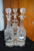 Three Piece Cut Glass Decanter Set with Stand
