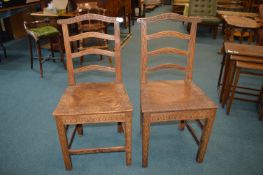Two Carved Wooden Chairs