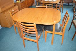 Retro Teak Extending Dining Table and Four Chairs with Upholstered Seats