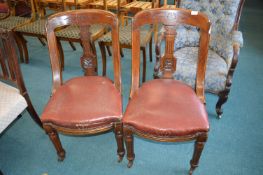 Pair of Carved Dining Chairs with Faux Leather Seats