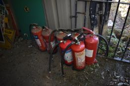 *Seven Fire Extinguishers