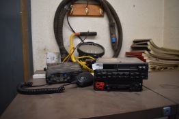 *Two CB Radios, Two Tape Players, and a Site Light