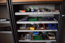 *Contents of Three Storage Units to Include Screws