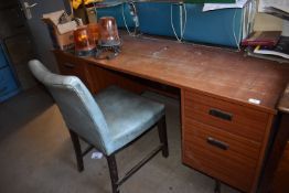 *Office Desk with Drawers, Blue Leather Chair, and