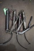 *Four Grease Guns