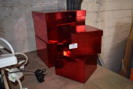 *Four Red Christmas Boxes