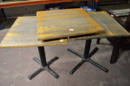 Two Steel Pedestal Tables with Wooden Tops, plus a