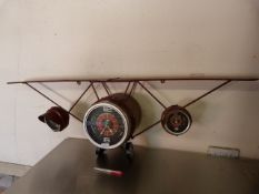 Wall Mounted Retro Style Clock in the form of a Pl