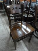 Thirteen Brown Wooden Chairs