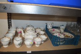 *Quantity of Decorative Teapots, Teacups, and Saucers etc. (tray not included)