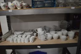 *Shelf of Milk Jugs, Cups & Saucers, Side Plates, etc.