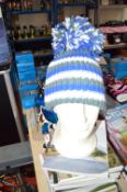 *Bobble Hat in Grey, White, and Blue