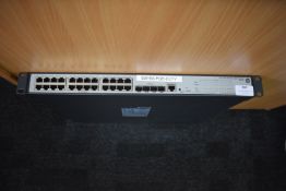 *HP V1910-24G-POE Switch JE007A (located in main office, across the road)