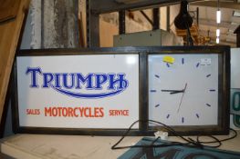 *Triumph Sales Sign and Clock