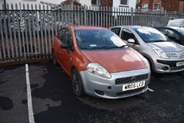 *Fiat Punto (five door, red) Reg: WR06 LCO, Mileage: 76751