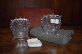 *Two Glass Candle Holders and a Towel