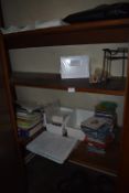 *Contents of Cupboard; Relaxation CDs, Health and Beauty Books, Consultation Cards, and Face
