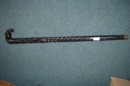 Carved Ebonised Walking Stick with Elephant Handle
