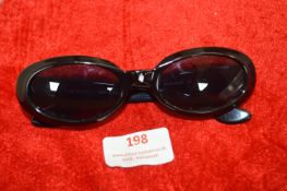 Pair of Gucci Sunglasses