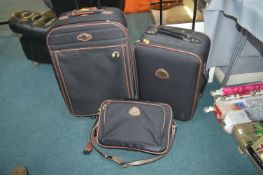 Two Suitcase and a Travel Bag