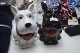 Two Black and White Scotty Dogs