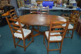 Ercol Oval Extending Dining Table with Six Matchin