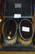 Pair of Silver Rimmed Clothes Brushes in Leather C