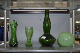 Four Green Glass Vases