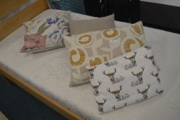 Four Assorted Cushions