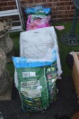 Four Bags of Compost and a Bag of Landscape Bark