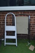 Folding Step Stool and a Garden Chair