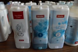 *Three Assorted Bottles of Miele Detergent