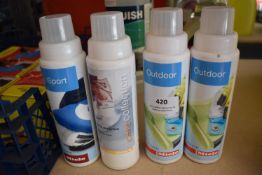 *Four Bottles of Detergent