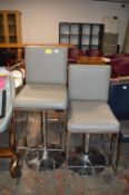 *Two Grey Leatherette Stools with Chrome Footrest
