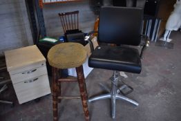 Gas-Lift Barber's Chair and a Wooden High Stool