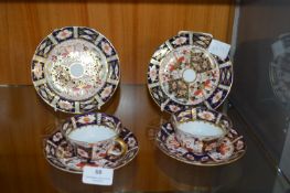 Two Royal Crown Derby Trios
