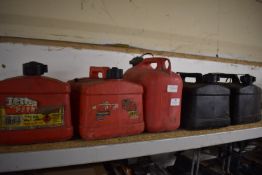 *Five Plastic Fuel Cans