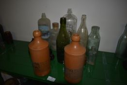 Collection of Glass Bottles and Two Norfolk Punch Stoneware Bottles