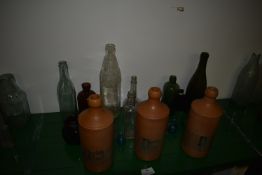 Collection of Glass Bottles and Three Norfolk Punch Stoneware Bottles